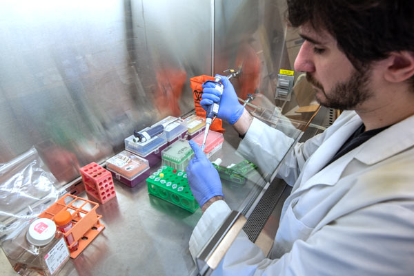 Pathologist with tools